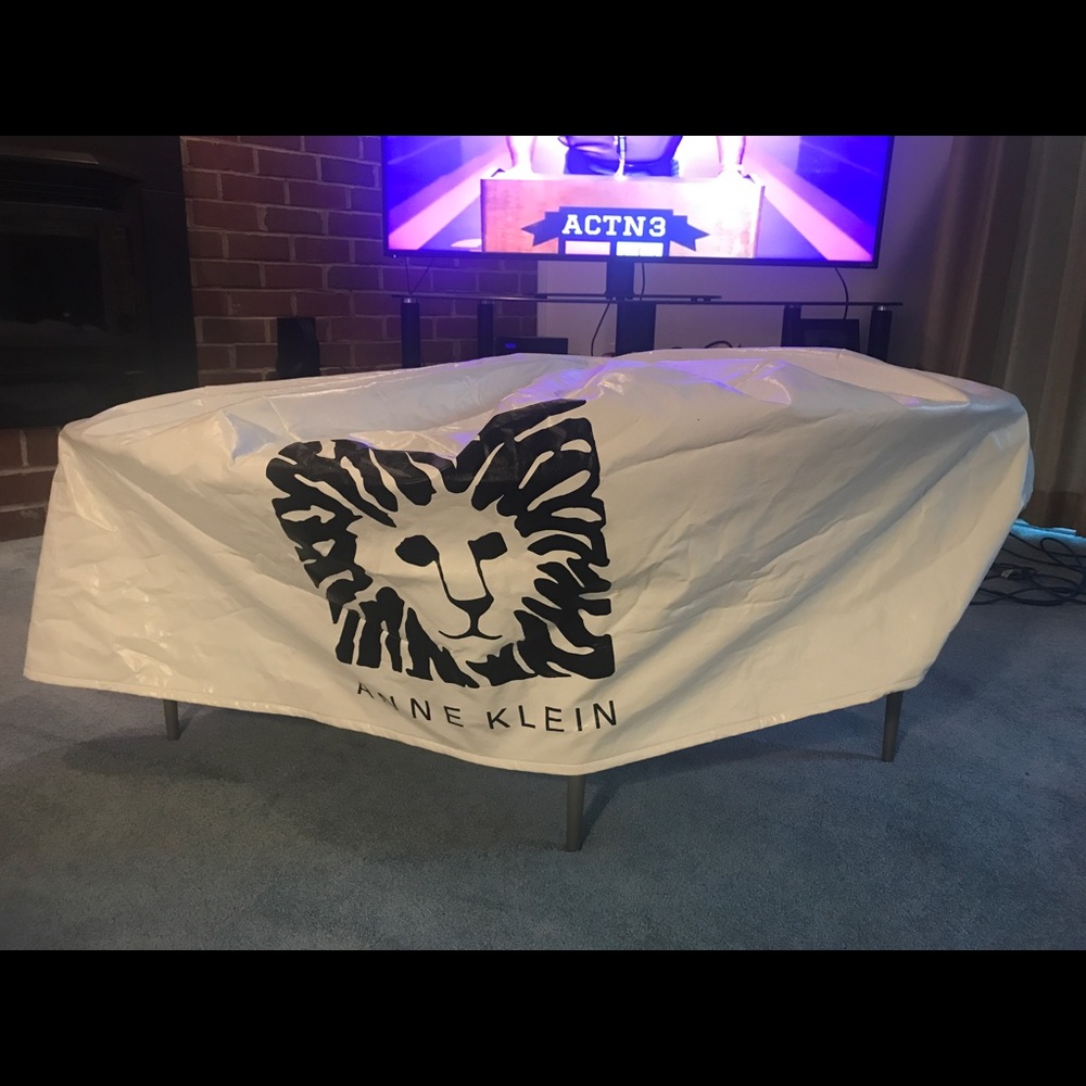 Anne Klein logo round table cover by Viaggio